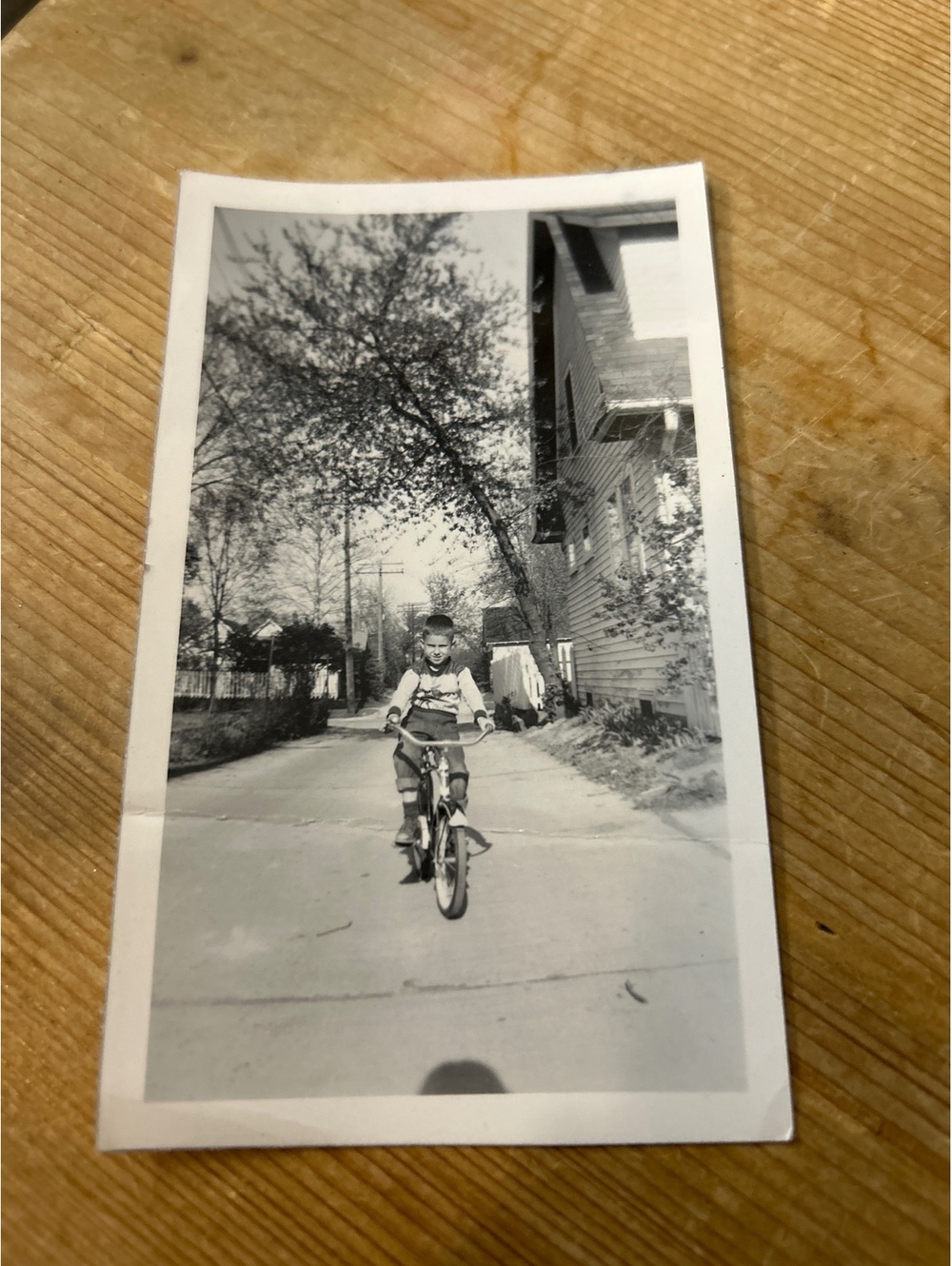 Photograph from 1953 a child’s first day with a bicycle